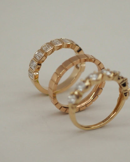 0.13 TCW Round Twisted Moissanite Wedding Band