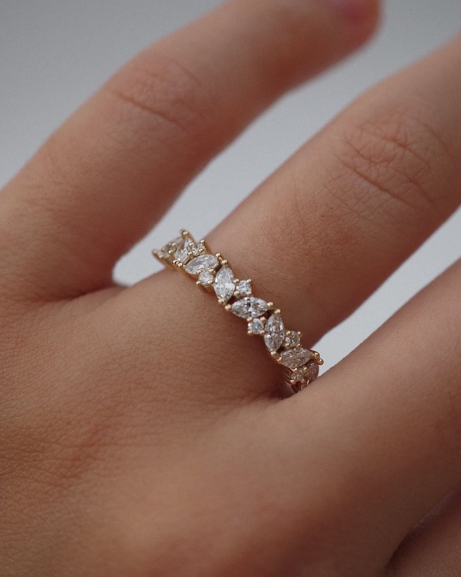 0.13 TCW Round Twisted Moissanite Wedding Band