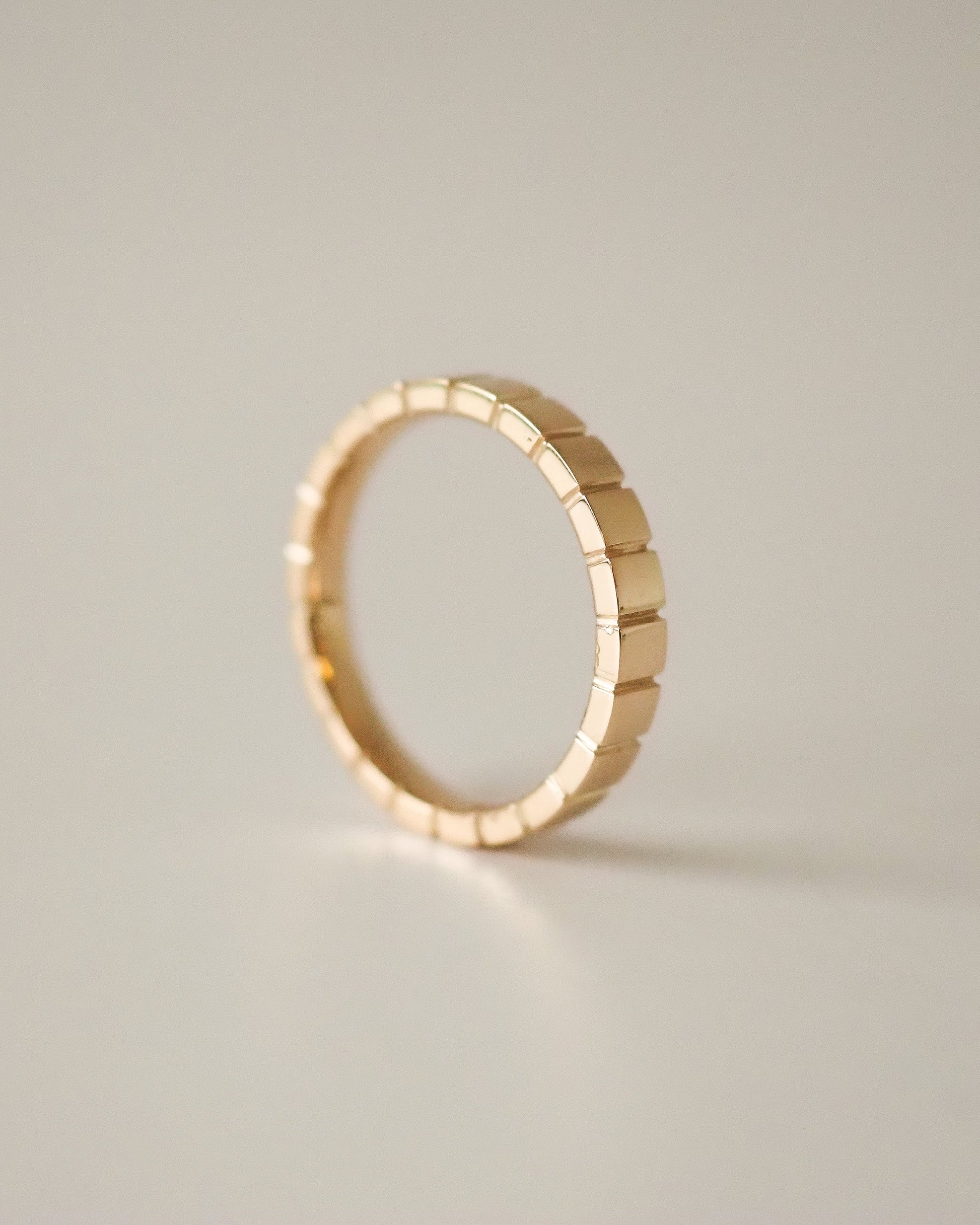 0.13 TCW Round Twisted Moissanite Wedding Band
