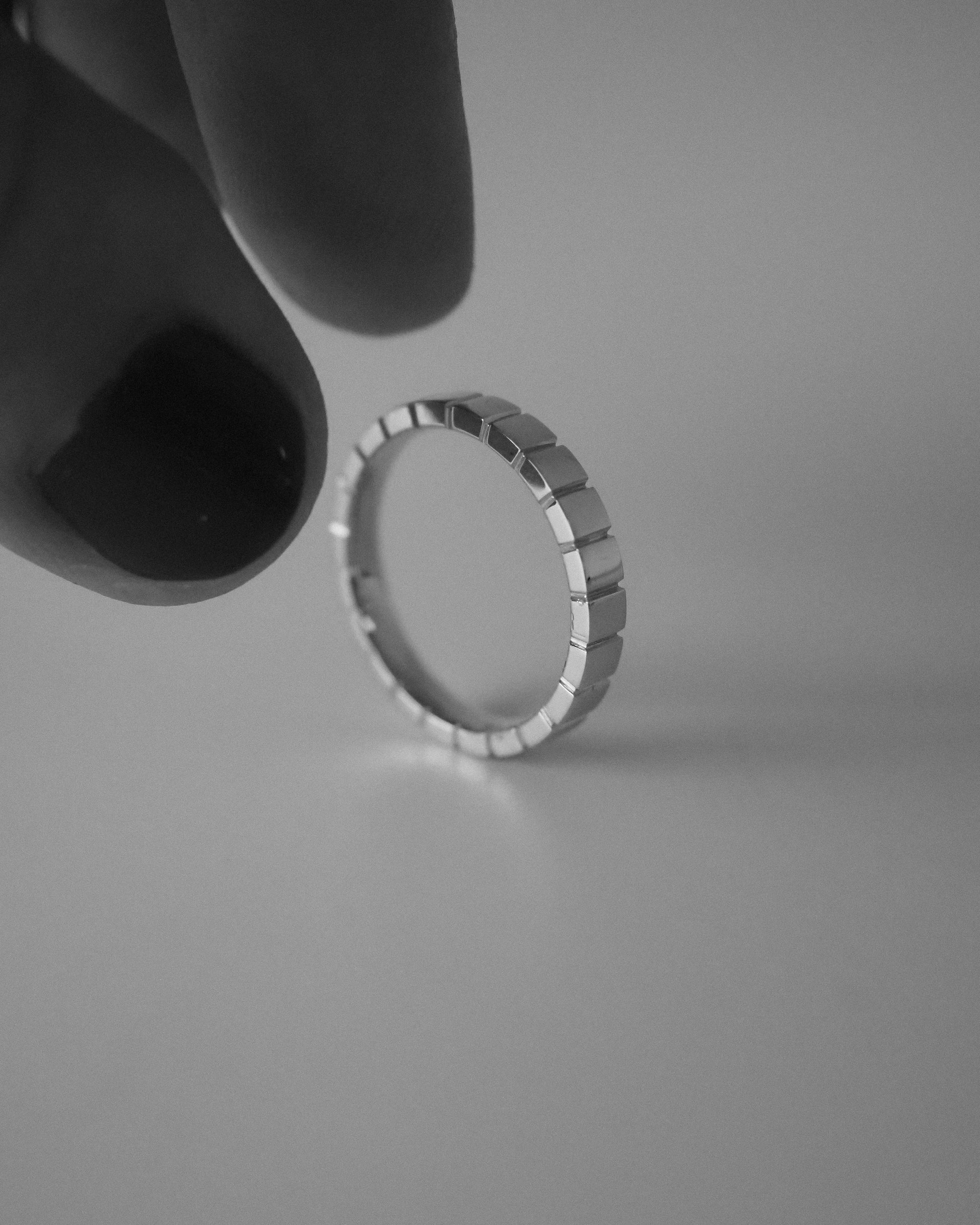 0.13 TCW Round Twisted Moissanite Wedding Band