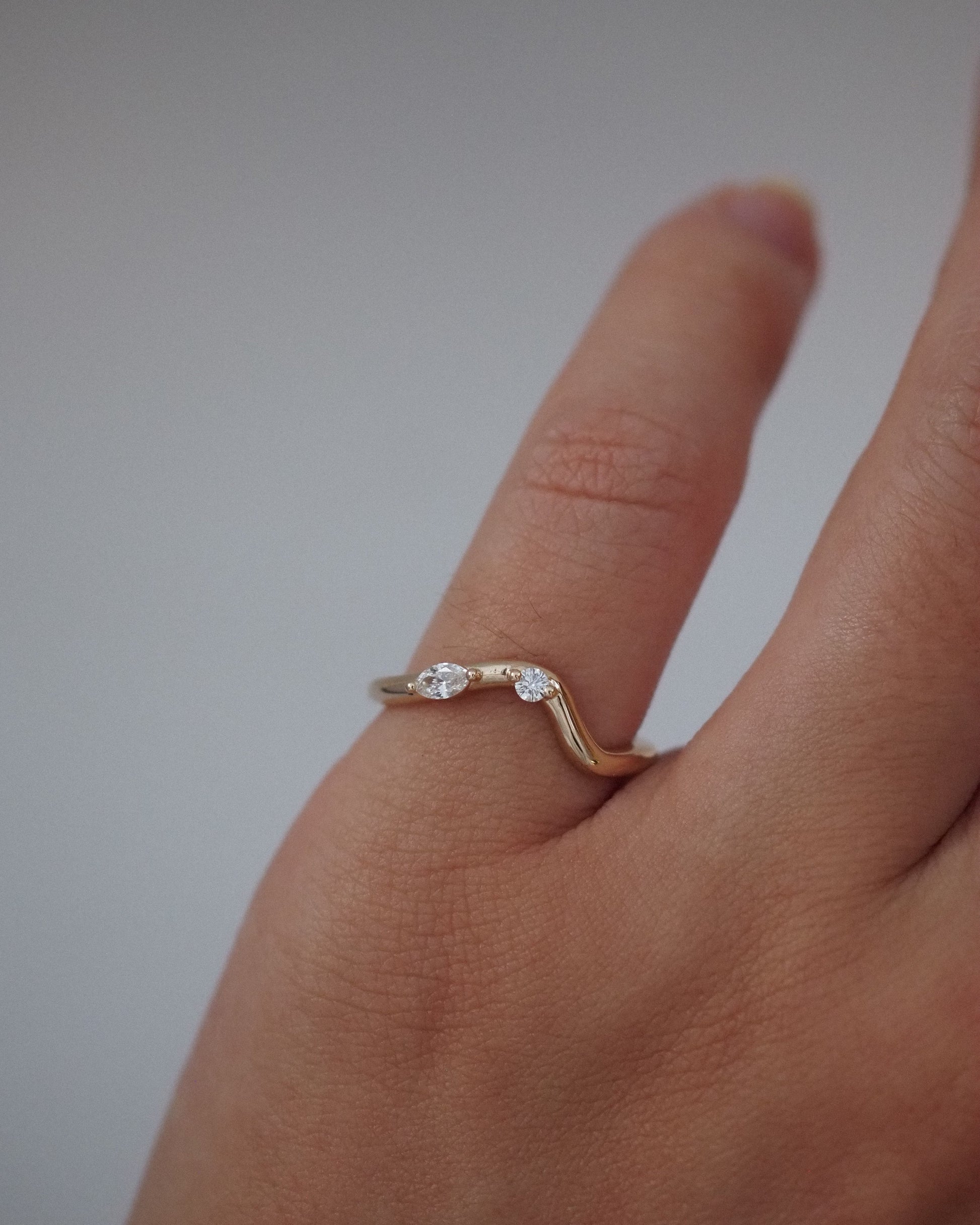 0.13 TCW Round Twisted Moissanite Wedding Band