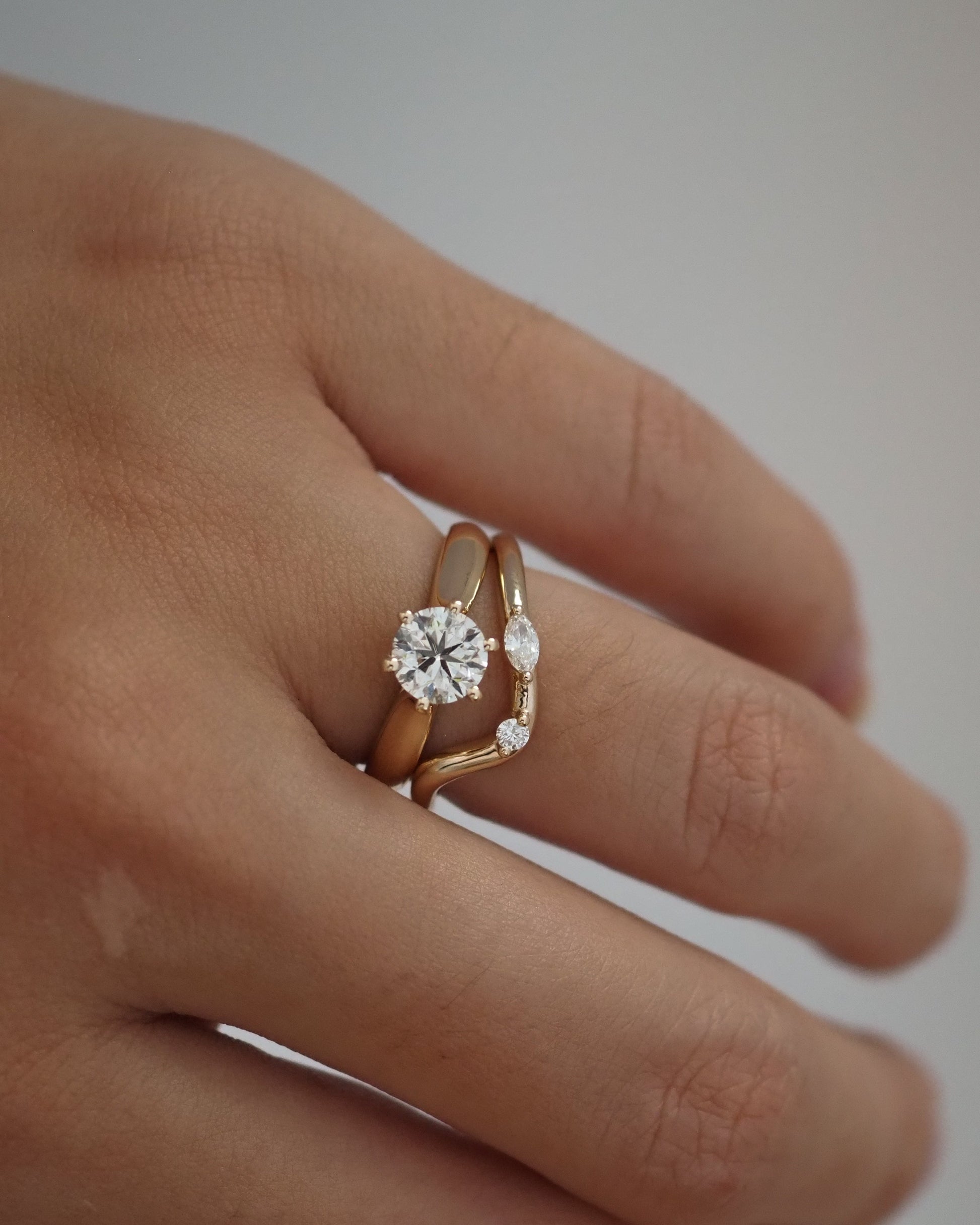 0.13 TCW Round Twisted Moissanite Wedding Band