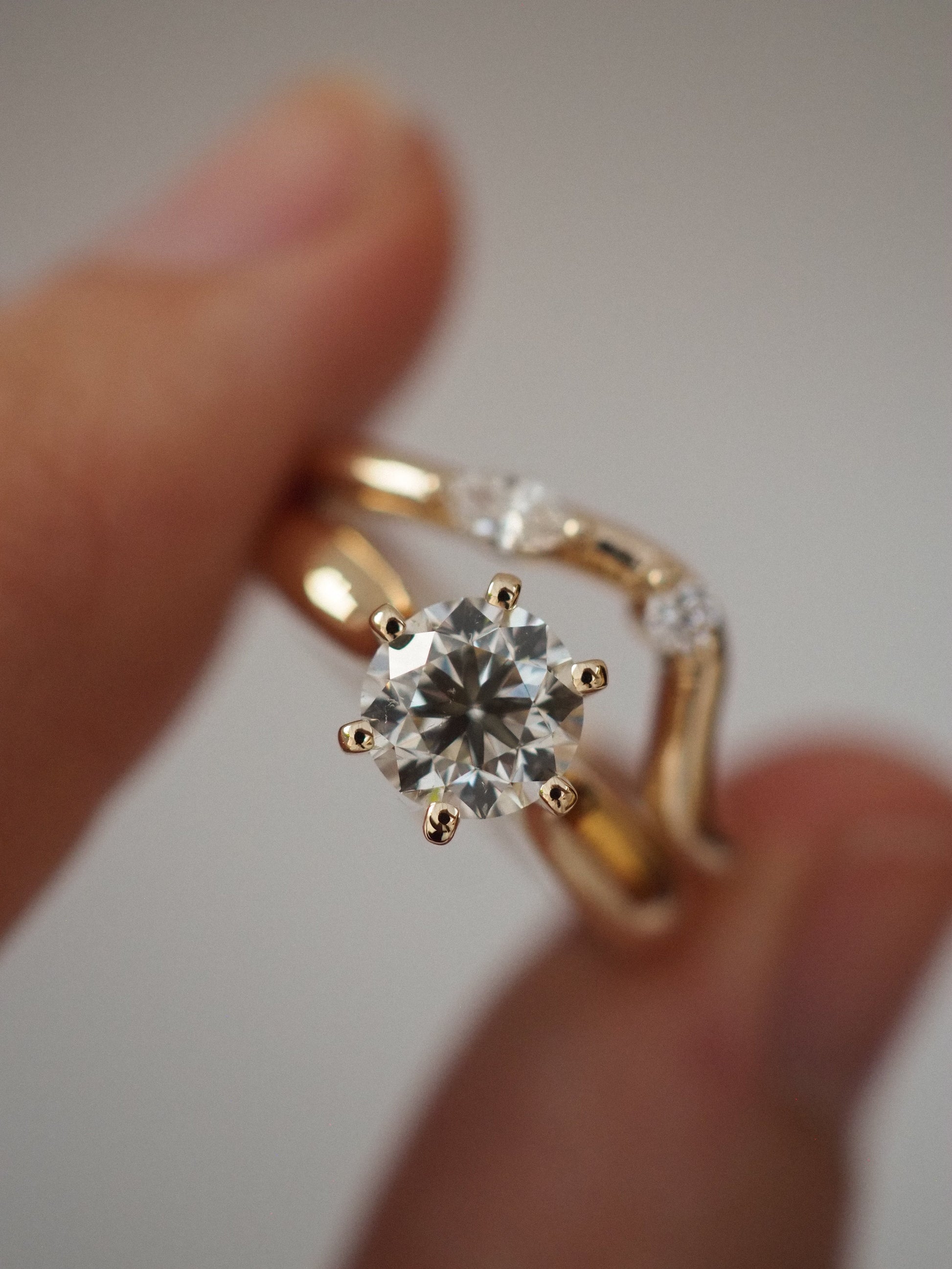 0.13 TCW Round Twisted Moissanite Wedding Band