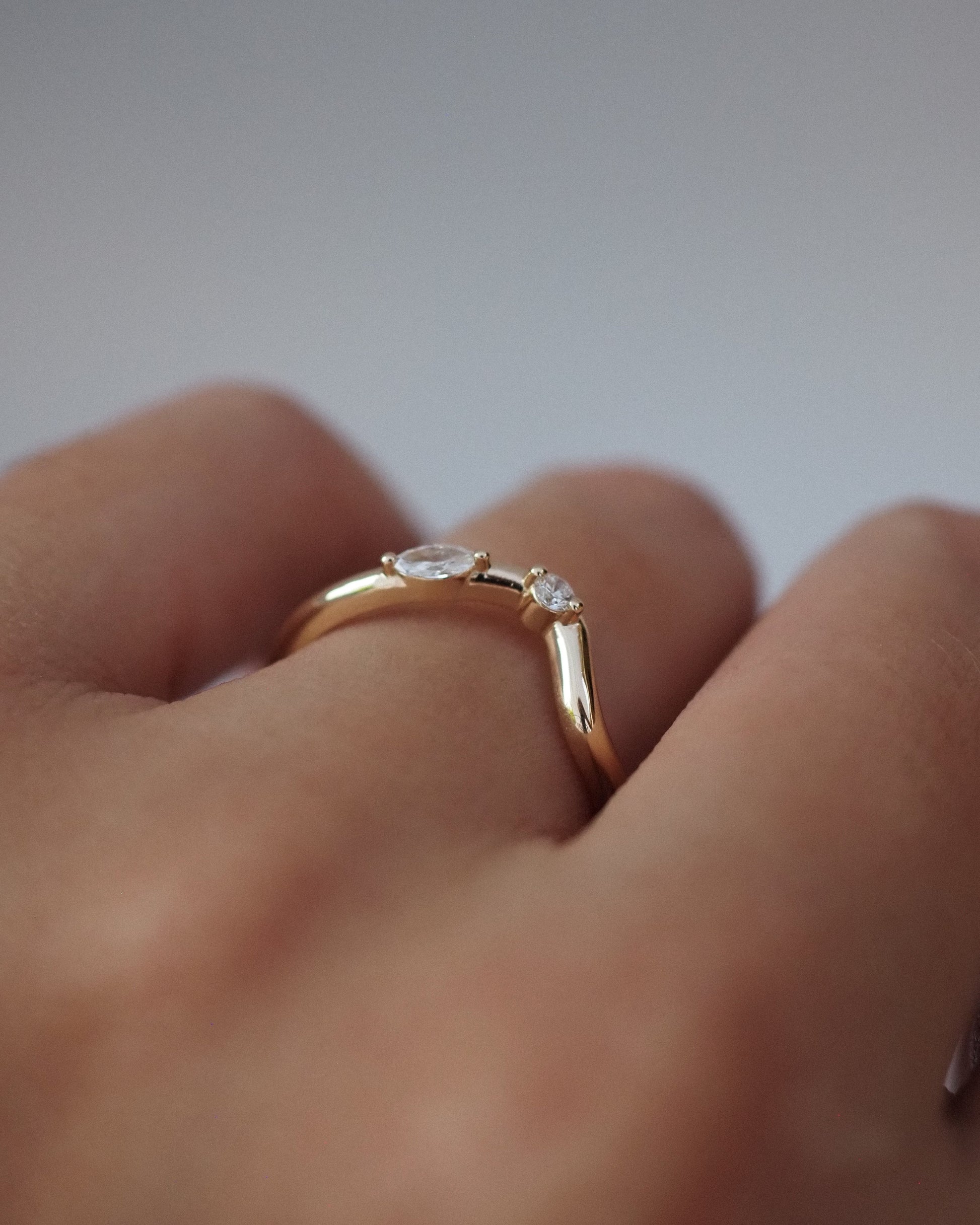 0.13 TCW Round Twisted Moissanite Wedding Band