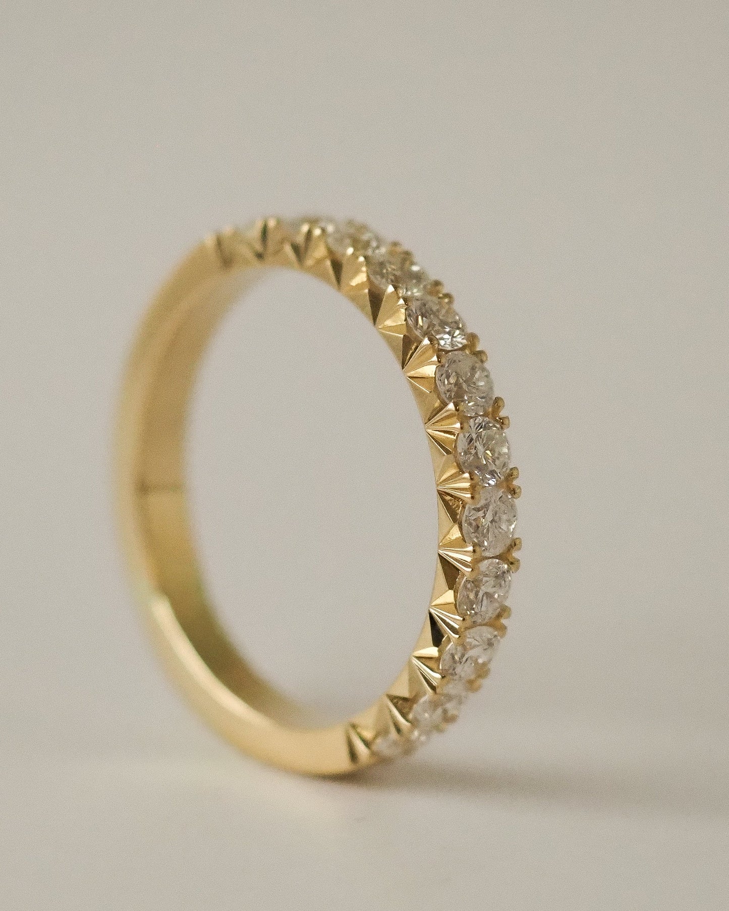 0.13 TCW Round Twisted Moissanite Wedding Band