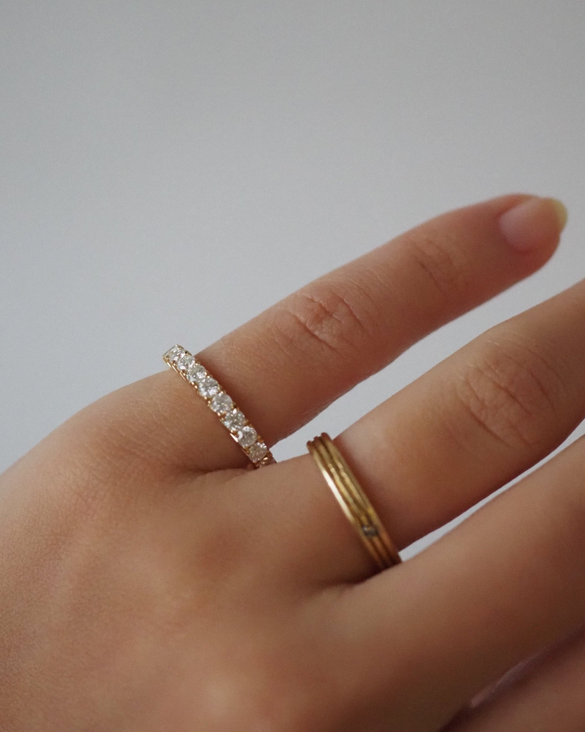 0.13 TCW Round Twisted Moissanite Wedding Band