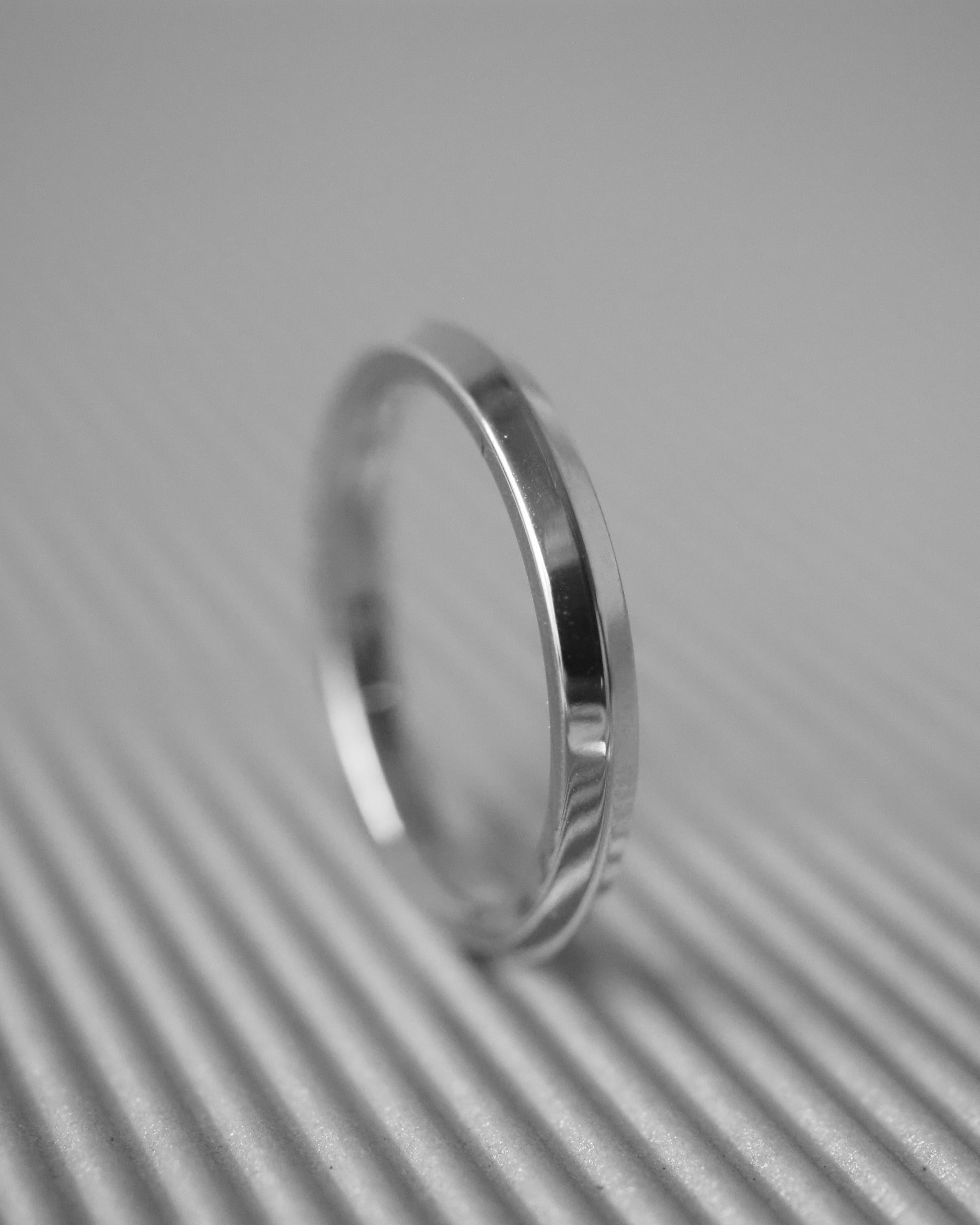 0.13 TCW Round Twisted Moissanite Wedding Band