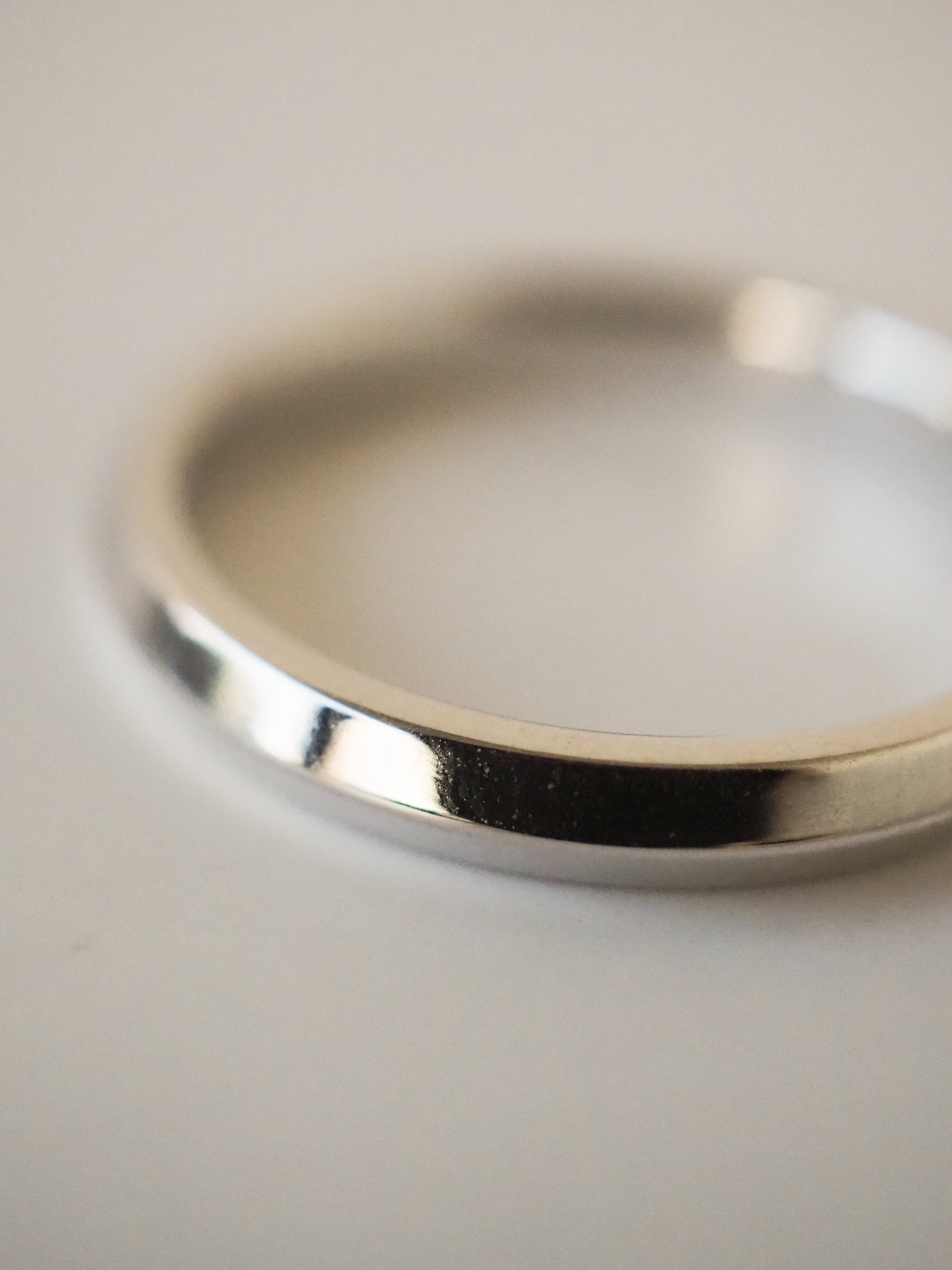 0.13 TCW Round Twisted Moissanite Wedding Band