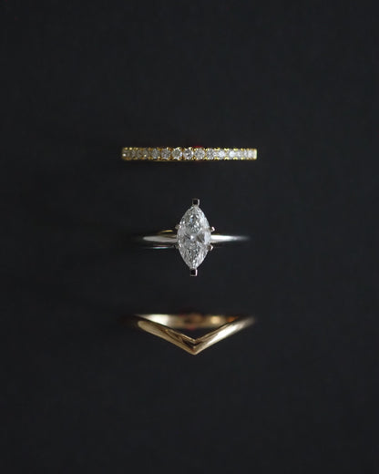 0.13 TCW Round Twisted Moissanite Wedding Band