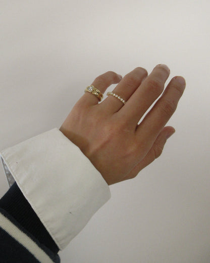 0.13 TCW Round Twisted Moissanite Wedding Band