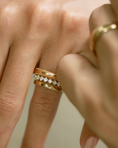 0.13 TCW Round Twisted Moissanite Wedding Band