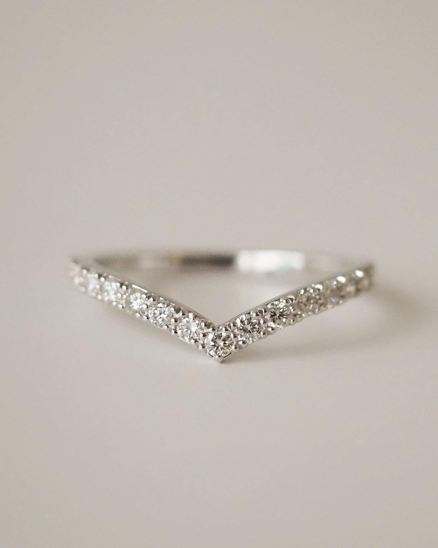 0.13 TCW Round Twisted Moissanite Wedding Band
