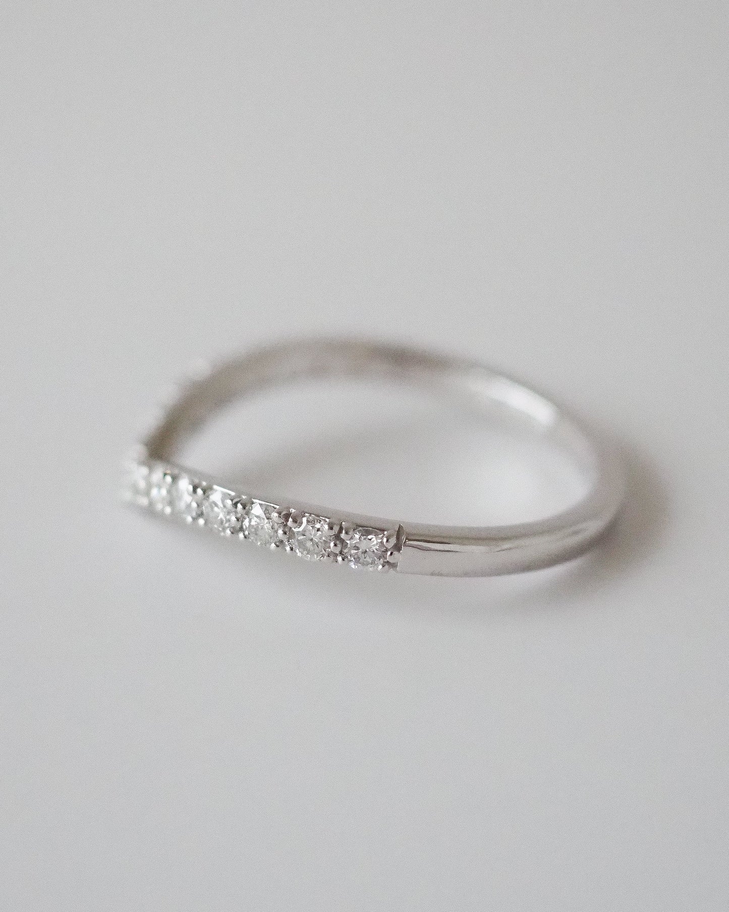 0.13 TCW Round Twisted Moissanite Wedding Band