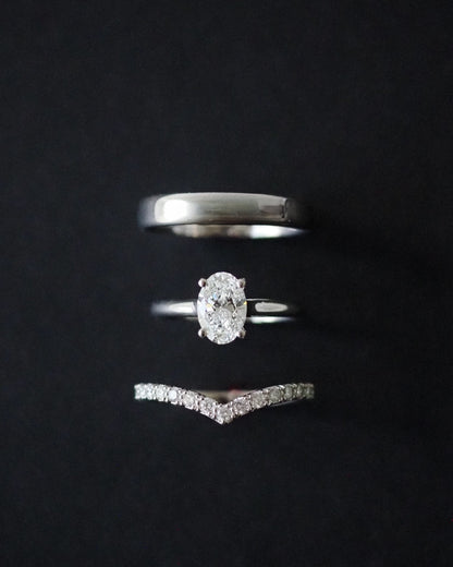 0.13 TCW Round Twisted Moissanite Wedding Band