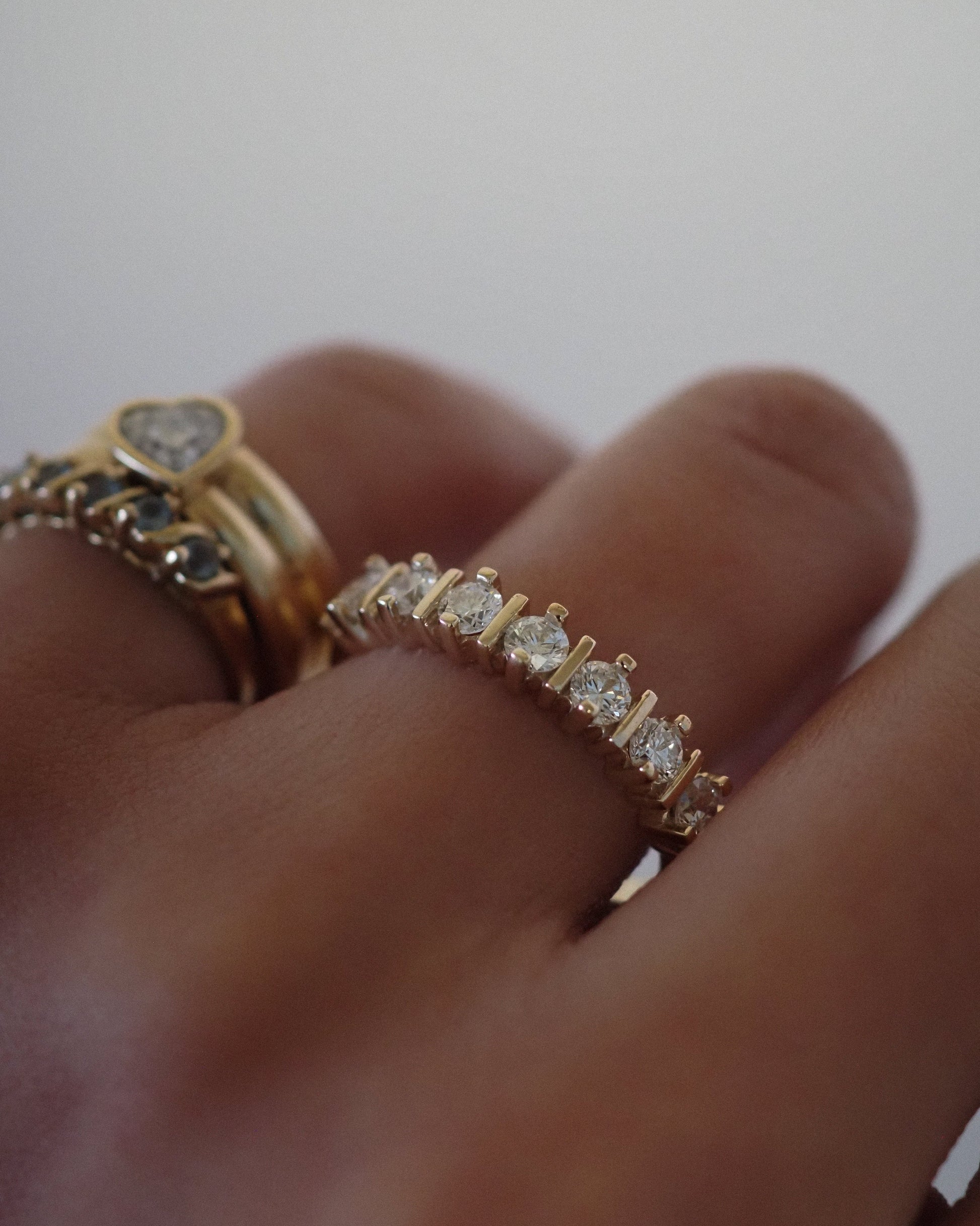 0.13 TCW Round Twisted Moissanite Wedding Band