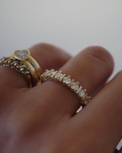 0.13 TCW Round Twisted Moissanite Wedding Band