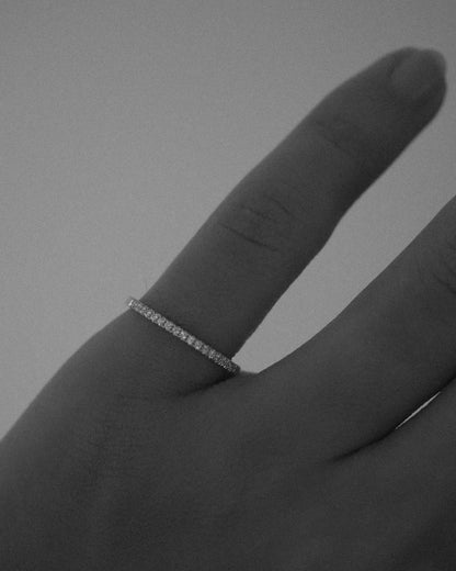 0.13 TCW Round Twisted Moissanite Wedding Band