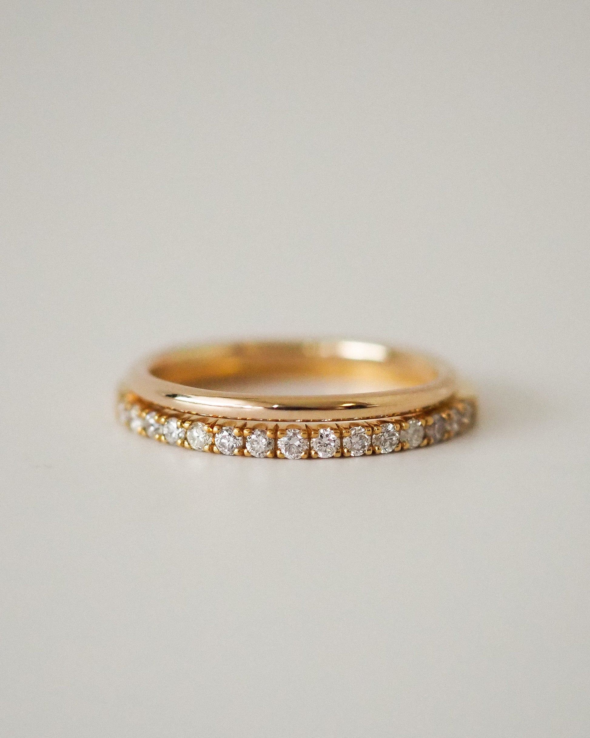0.13 TCW Round Twisted Moissanite Wedding Band
