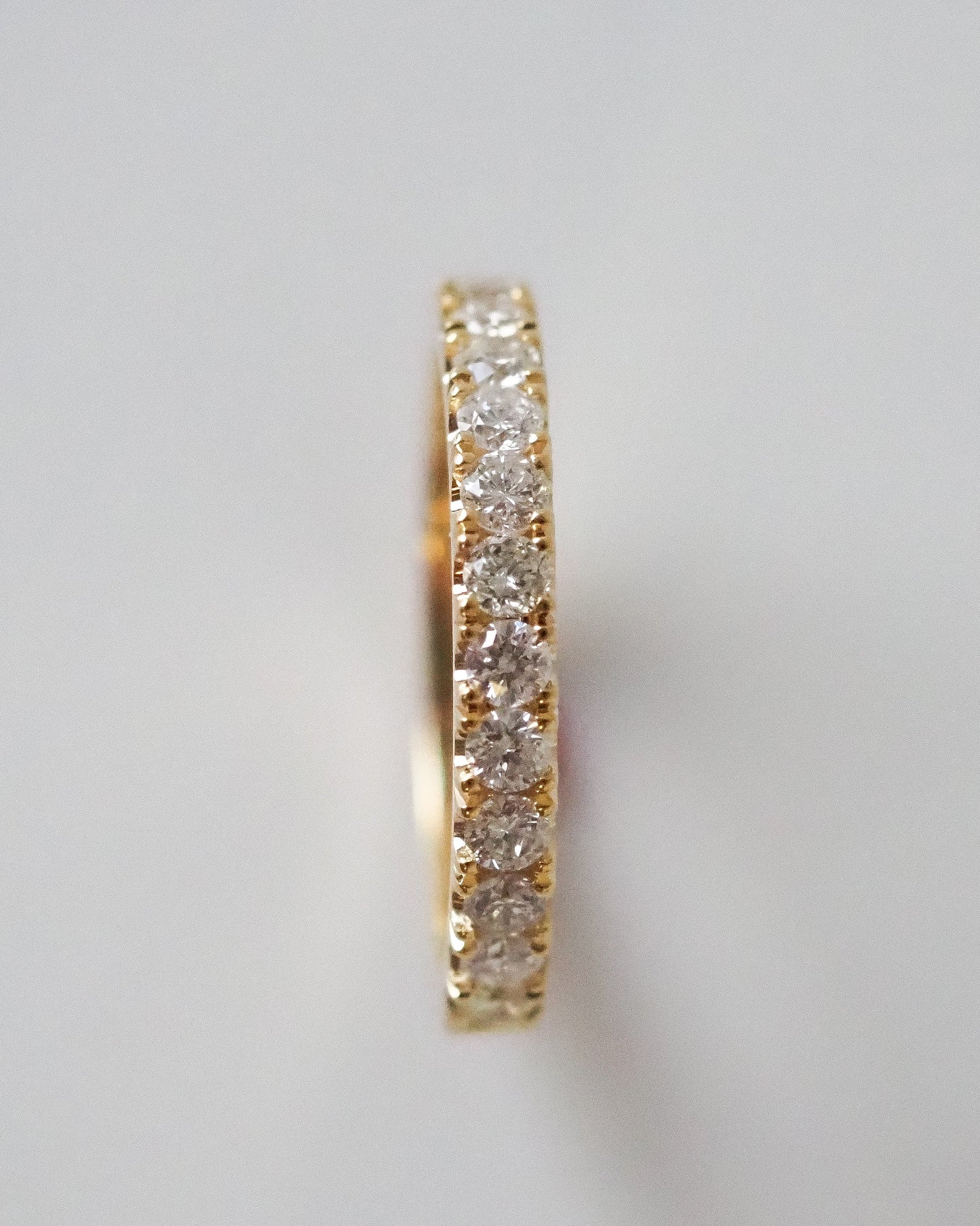 0.13 TCW Round Twisted Moissanite Wedding Band