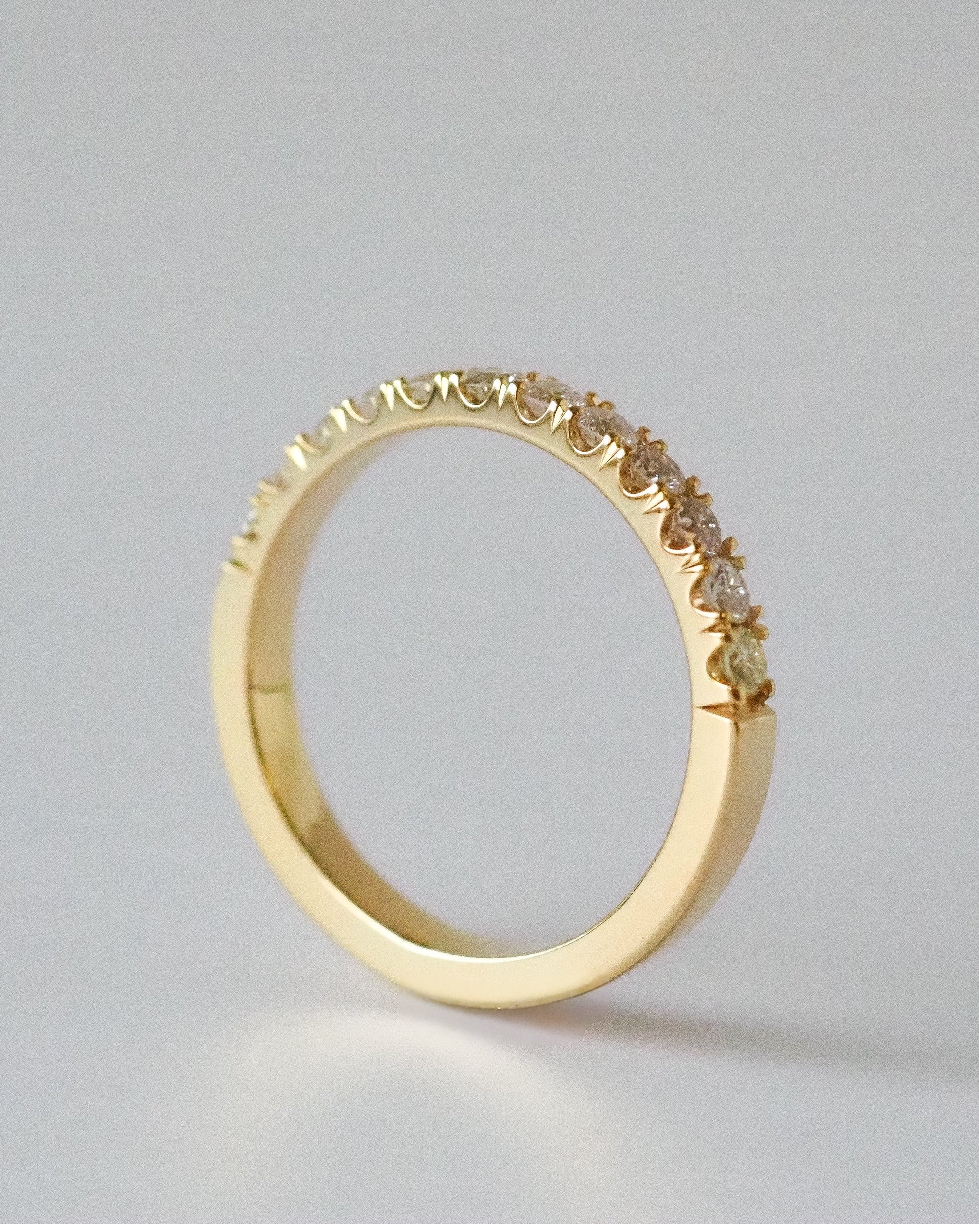 0.13 TCW Round Twisted Moissanite Wedding Band