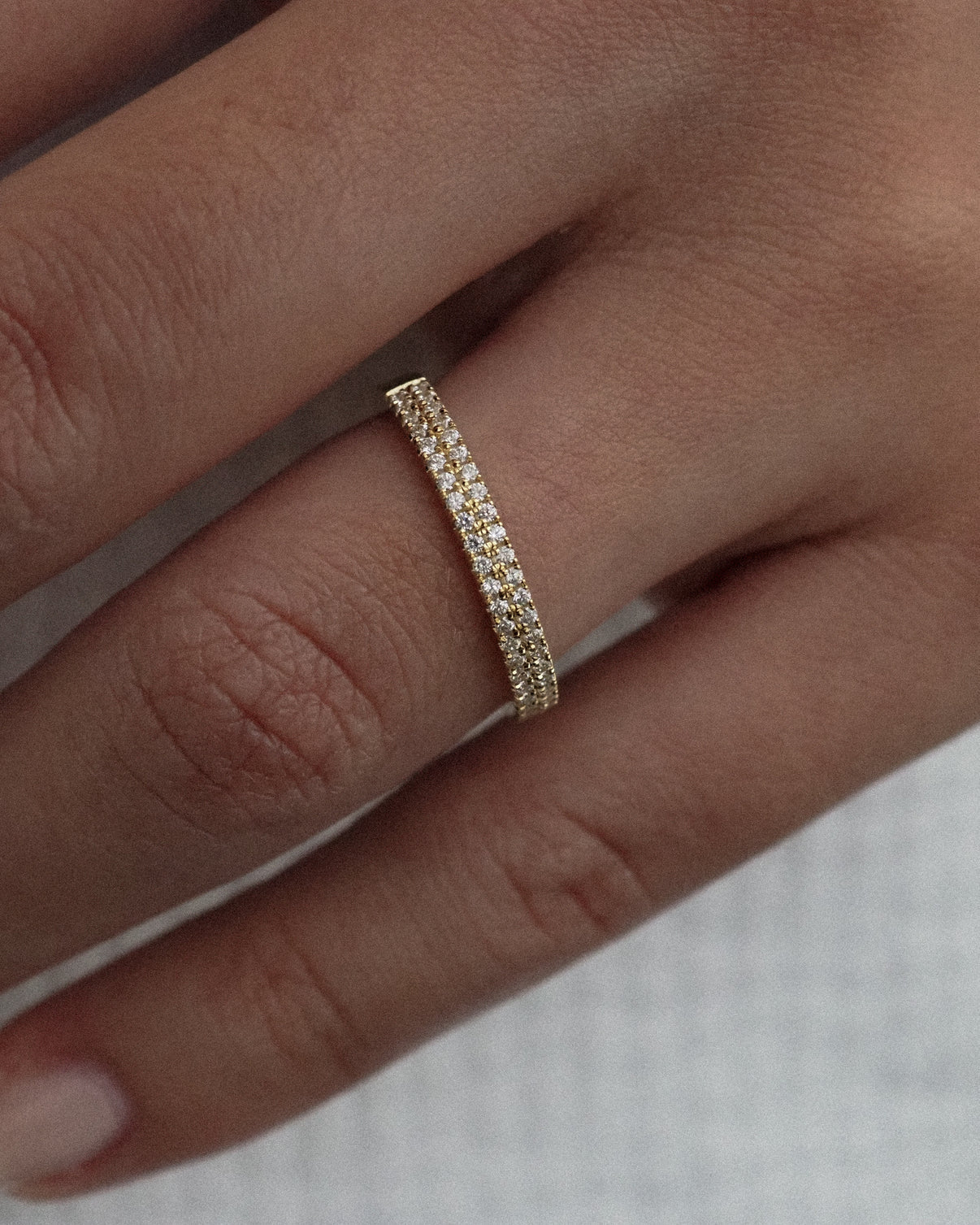 0.13 TCW Round Twisted Moissanite Wedding Band