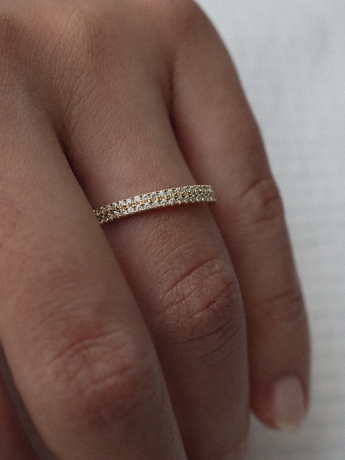 0.13 TCW Round Twisted Moissanite Wedding Band