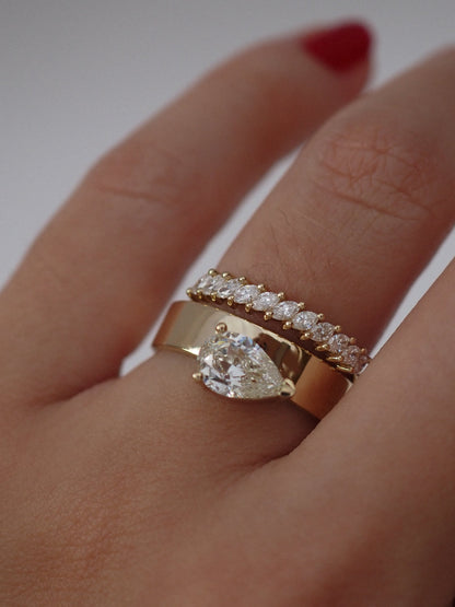 0.13 TCW Round Twisted Moissanite Wedding Band