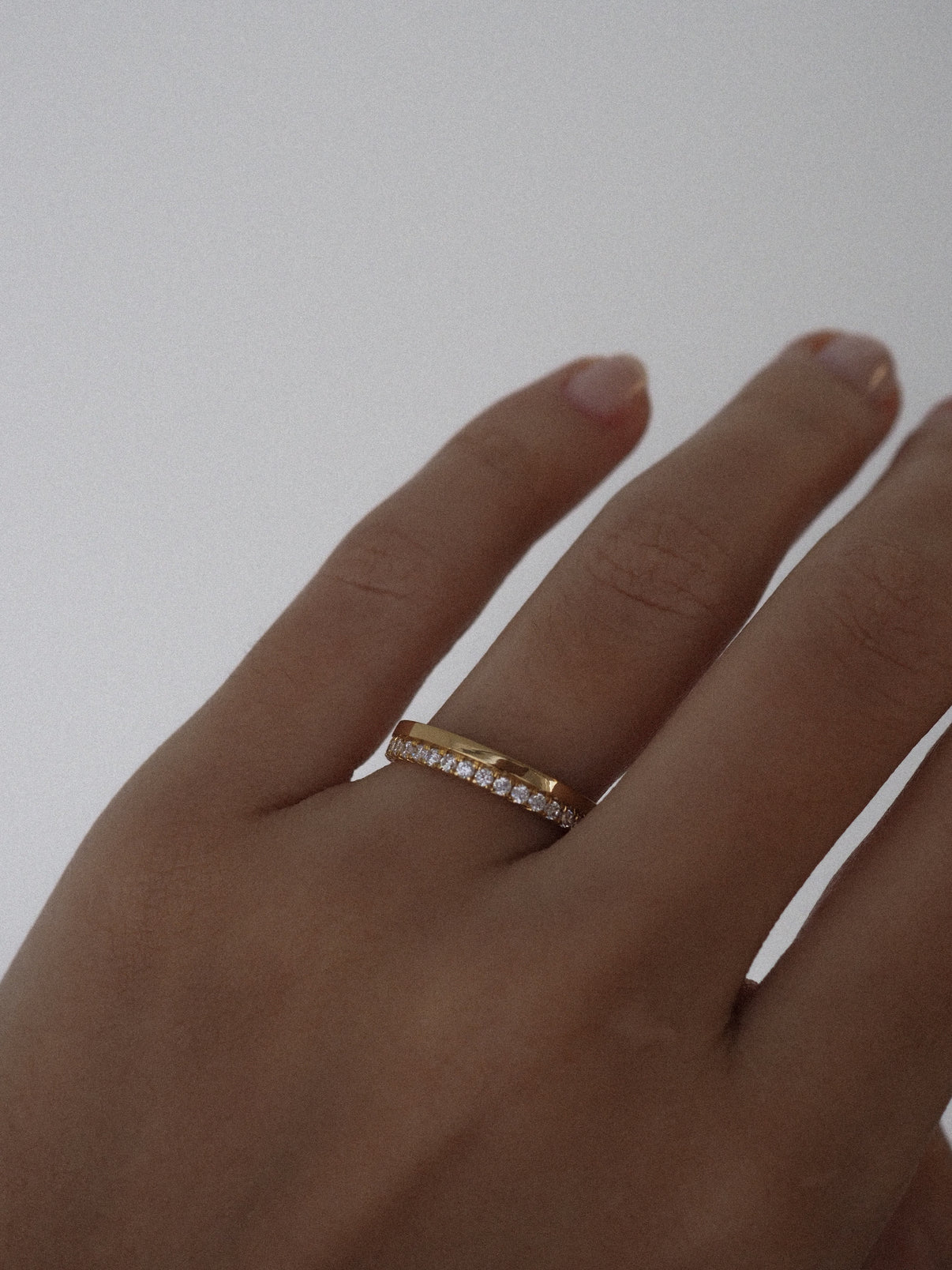 0.13 TCW Round Twisted Moissanite Wedding Band