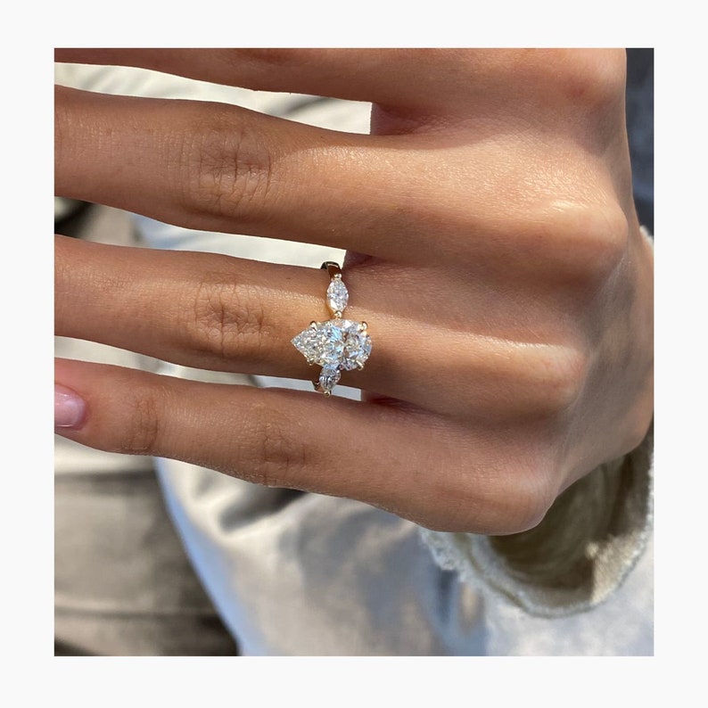 Stunning 1.75 CT Pear Moissanite Engagement Ring with Three Stone Design 6